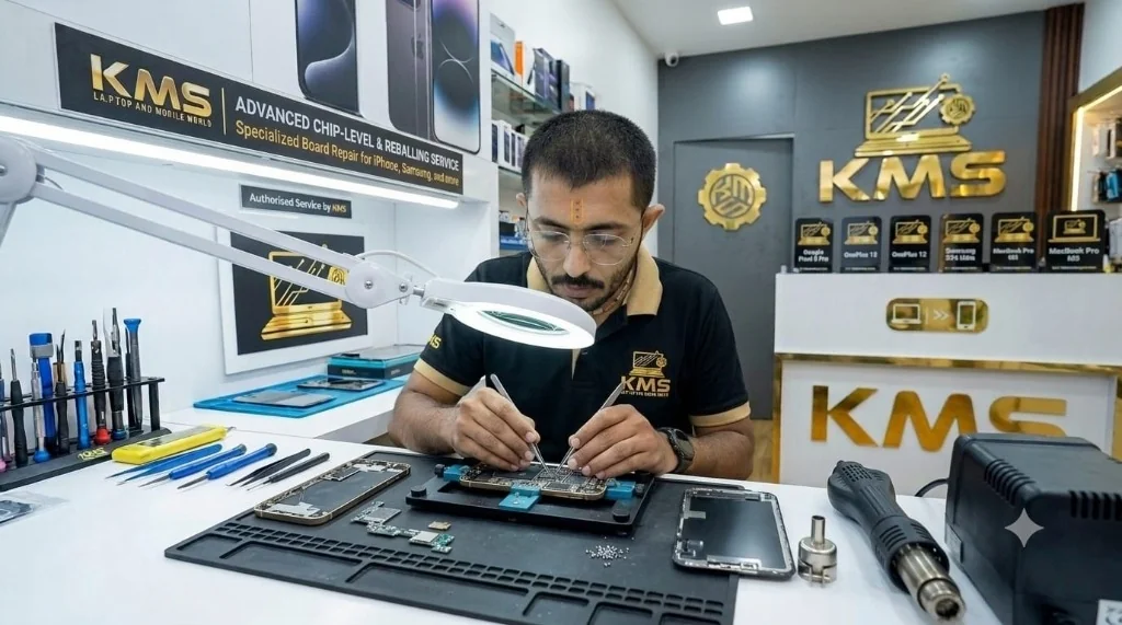 KMS technician replacing iPhone 17 Pro Max display assembly at Kollam repair center